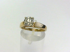 14 Karat Yellow and White Gold ladies diamond solitaire ring